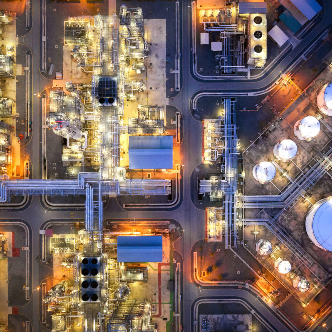 Large oil refinery industrial estates. Fuel refinery industry at night